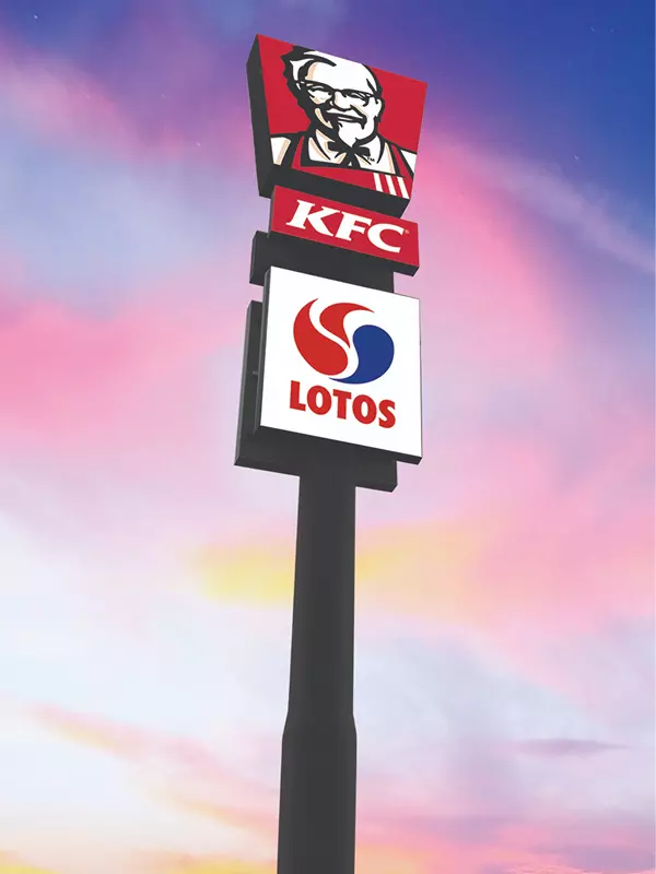 Logo Lotus i KFC o zachodzie słóńca